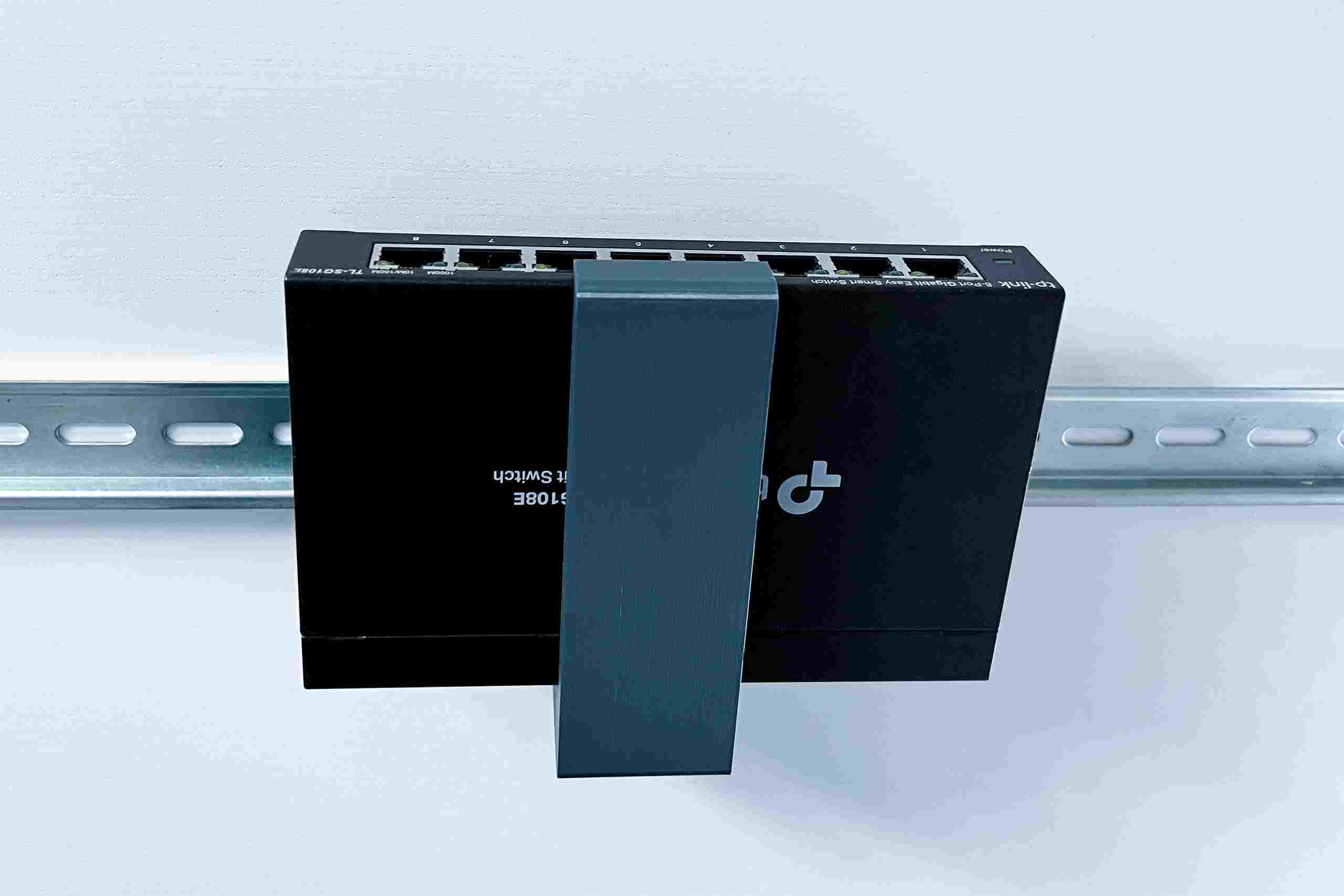 TP-Link D-TPDIN158 Držák na DIN lištu pro SG108xx,  SF1006P,  ER605,  RP108GE,  šedý3 